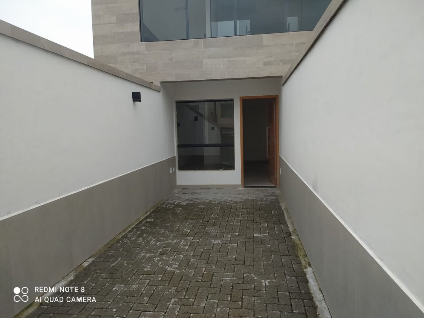 Casa com 3 dormitórios à venda, 92 m² por R$ 798.000,00 - Estuário - Santos/SP