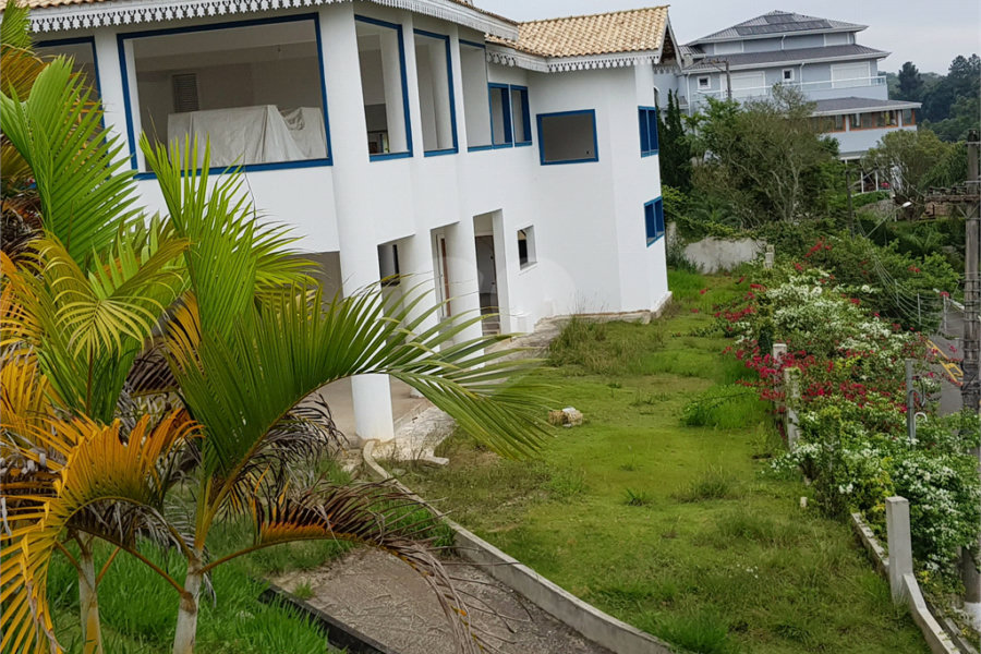 Casa à venda com 4 suítes no condomínio Suíça da Cantareira, Mairiporã - SP