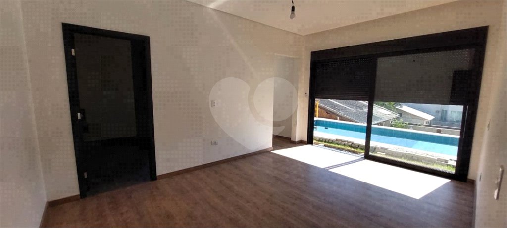 Casa à venda com 4 suítes no condomínio Figueira Garden, Atibaia - SP