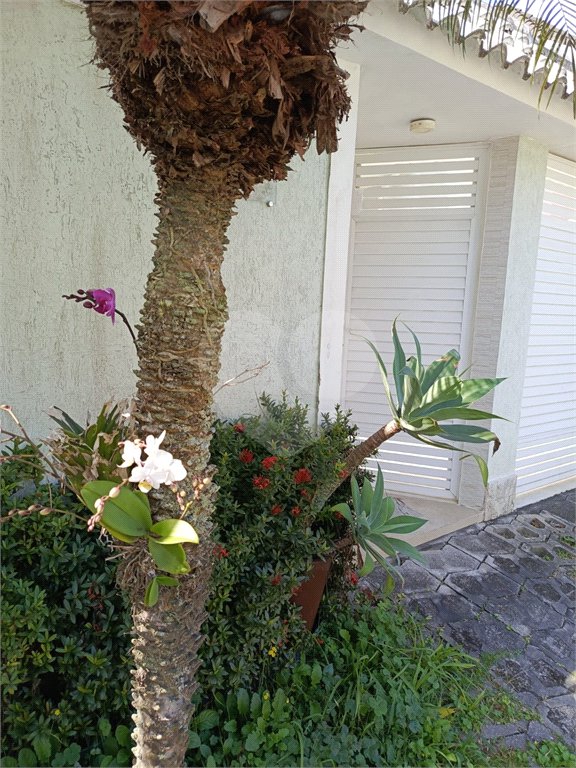Casa à venda com 4 quartos, sendo 1 suíte, no condomínio Atlantico Sul, Rio de Janeiro - RJ