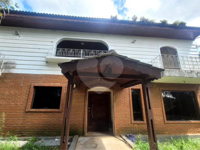 Casa à venda com 4 suítes no condomínio Alpes da Cantareira, Mairiporã - SP