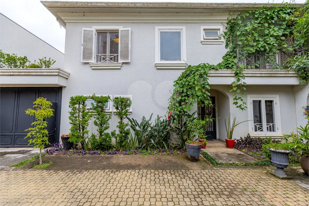 Casa à venda com 4 suítes no condomínio Saint Germain, São Paulo - SP