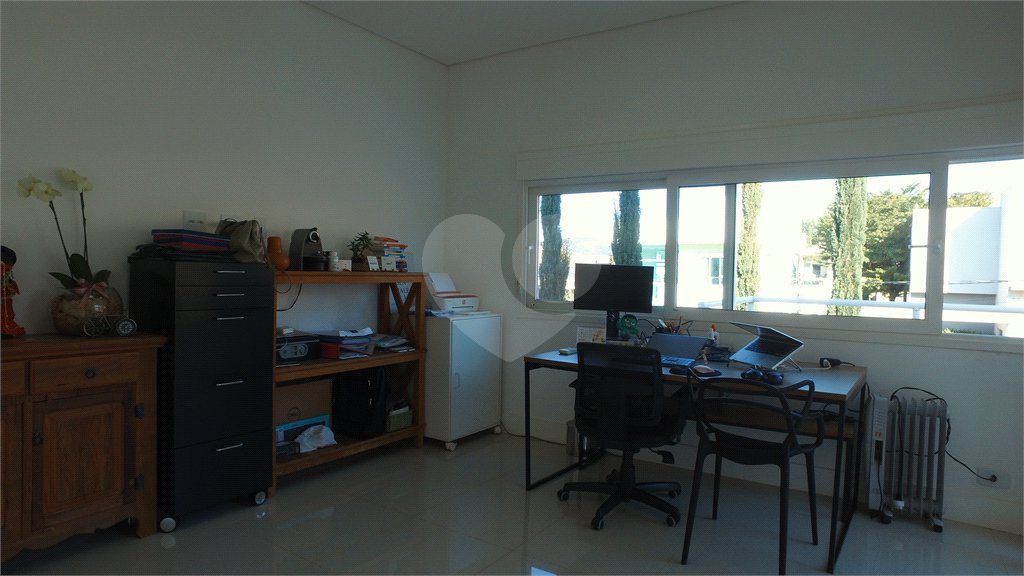 Casa à venda com 4 suítes no condomínio Figueira Gardn, Atibaia - SP