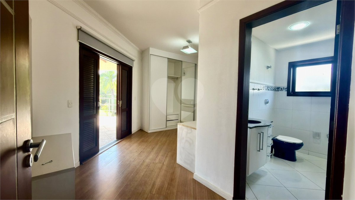 Casa à venda com 4 suítes no condomínio Parque Village Castelo, Itu - SP