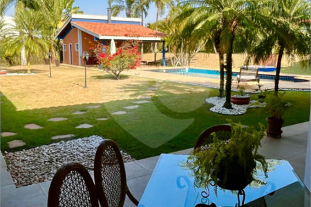 Casa à venda com 4 suítes no condomínio Residencial Vale das Laranjeiras, Indaiatuba - SP