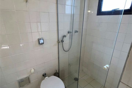 Apartamento com 4 dormitórios à venda, 259 m² por R$ 900.000,00 - Jardim Três Marias - Guarujá/SP