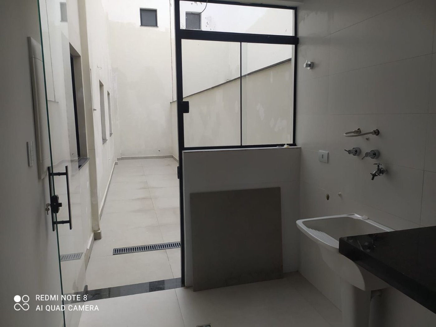 Casa com 3 dormitórios à venda, 92 m² por R$ 798.000,00 - Estuário - Santos/SP
