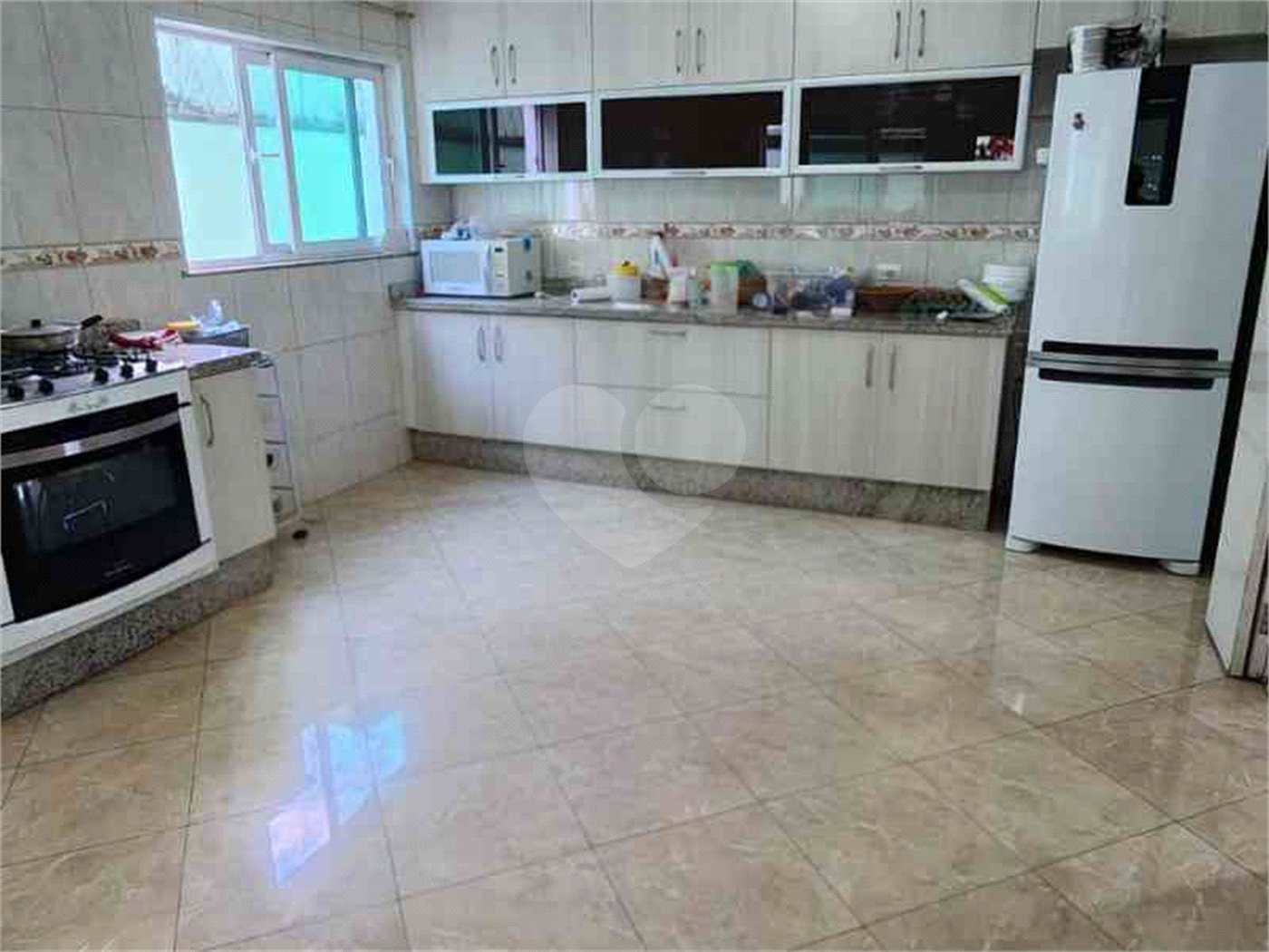 Casa à venda com 3 suítes no condomínio Quinta de Santo Antônio, São Paulo - SP
