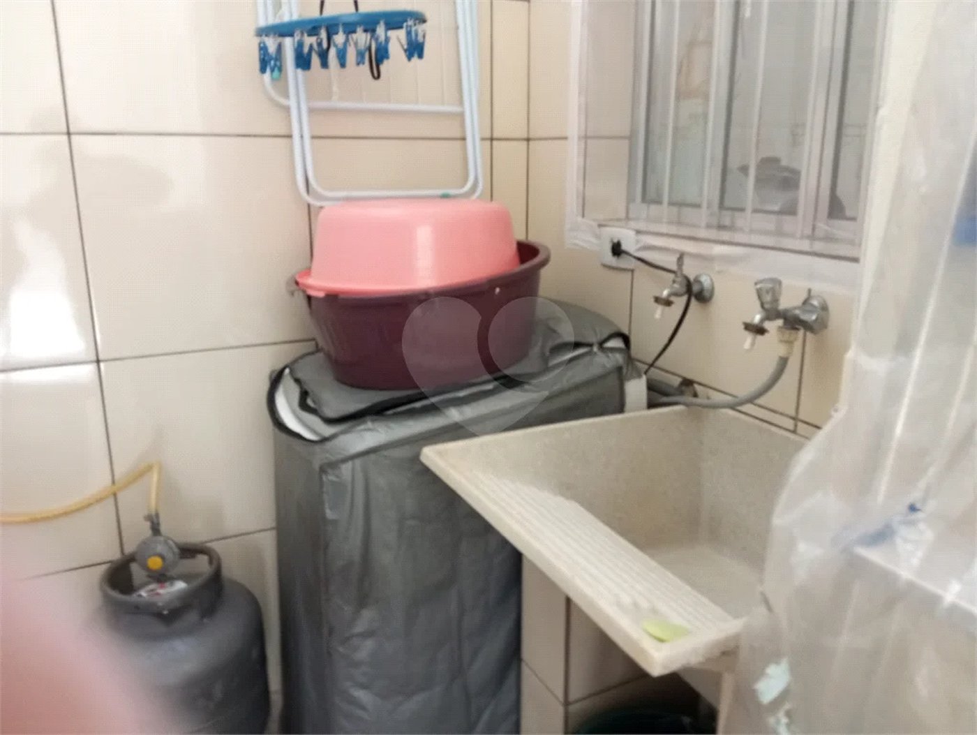 Terreno á venda com 2 casas na Vila Rosália, Guarulhos, SP.