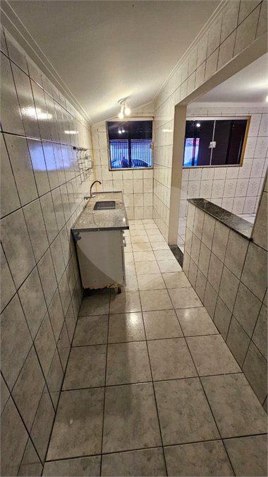 Excelente Casa Residencial no São Carlos 5 com 3 Quartos (1 Suíte) e Garagem Coberta para 2 Carros