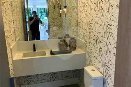 Casa à venda com 6 suítes no condomínio Golf CL, Bertioga - SP
