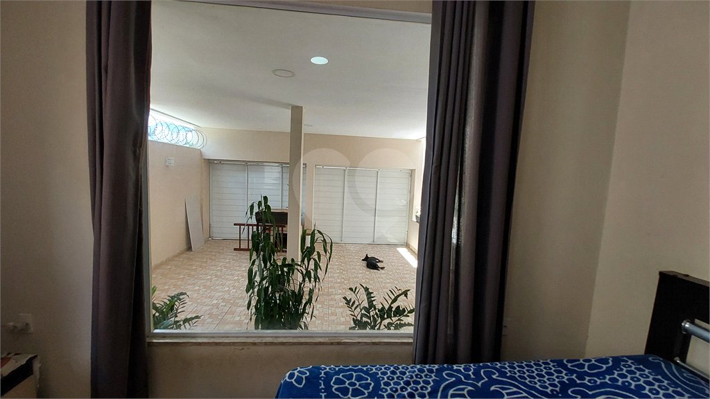 Casa à venda com 4 quartos, sendo 2 suítes, no condomínio Vivendas do Mendanha, Rio de Janeiro - RJ