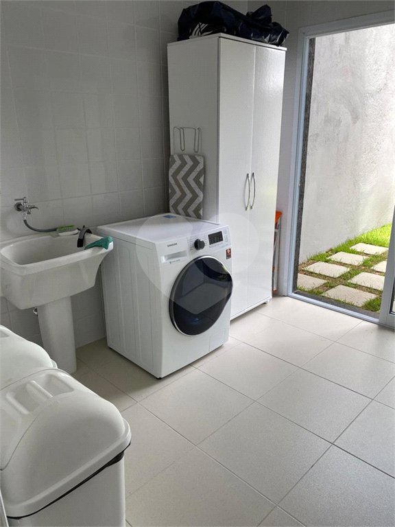 Casa à venda com 4 suítes no condomínio Reserva Ibirapitanga Ii, Santa Isabel - SP