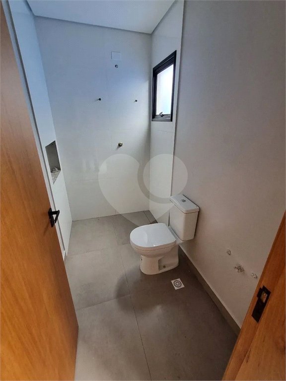 Casa à venda com 4 suítes no condomínio Park Lane, Guarujá - SP