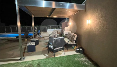 Casa à venda com 4 suítes no condomínio Figueira Garden, Atibaia - SP