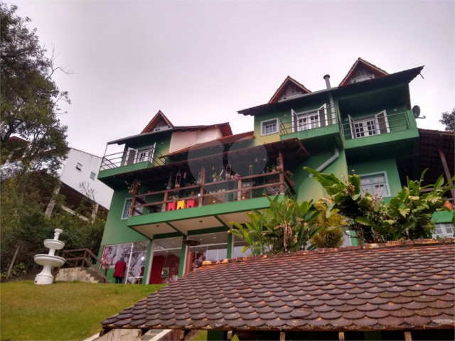 Casa à venda com 4 suítes no condomínio Alpes da Cantareira, Mairiporã - SP