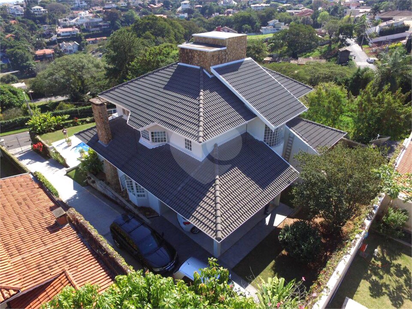 Casa à venda com 3 suítes no condomínio Estância Marambaia, Vinhedo - SP
