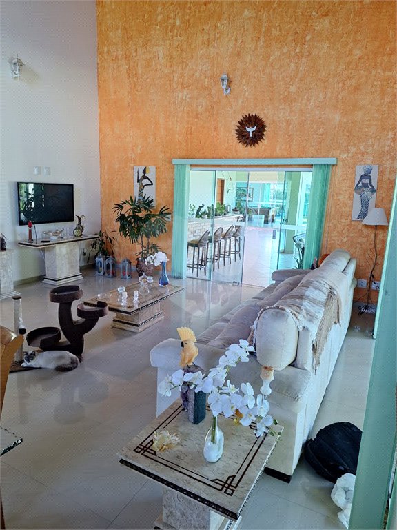 Casa à venda com 4 suítes no condomínio Bougainville, Peruíbe - SP