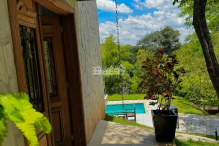 Casa à venda com 4 suítes no condomínio Portal Ouro Verde, Atibaia - SP