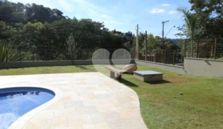 Casa à venda com 4 suítes no condomínio Suíça da Cantareira, Mairiporã - SP