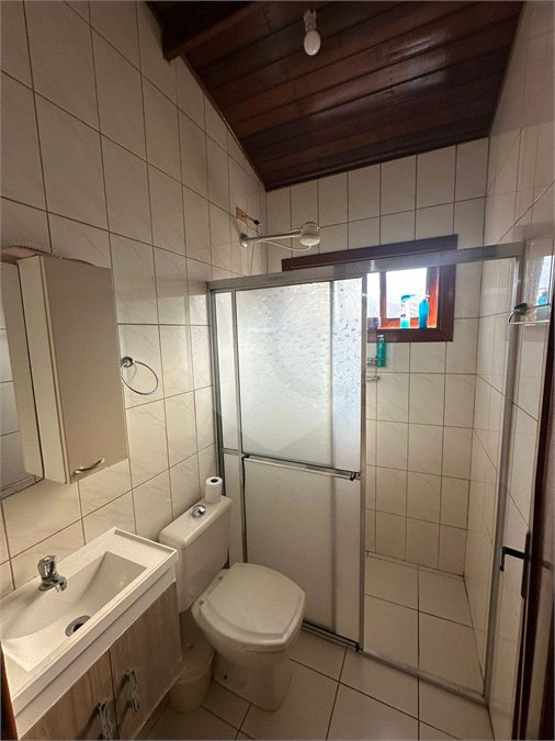 Casa à venda com 3 quartos, sendo 1 suíte,  no condomínio Morada da Praia, Bertioga - SP
