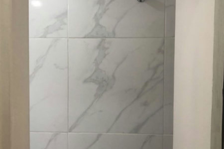 Casa com 3 dormitórios à venda, 116 m² por R$ 690.000,00 - Gonzaga - Santos/SP