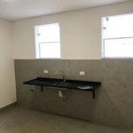 Casa com 3 dormitórios à venda, 116 m² por R$ 690.000,00 - Gonzaga - Santos/SP