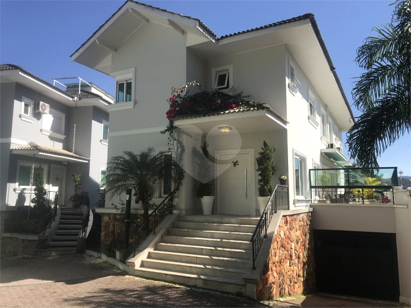 Casa à venda com 3 suítes no condomínio Quinta de Santo Antônio, São Paulo - SP