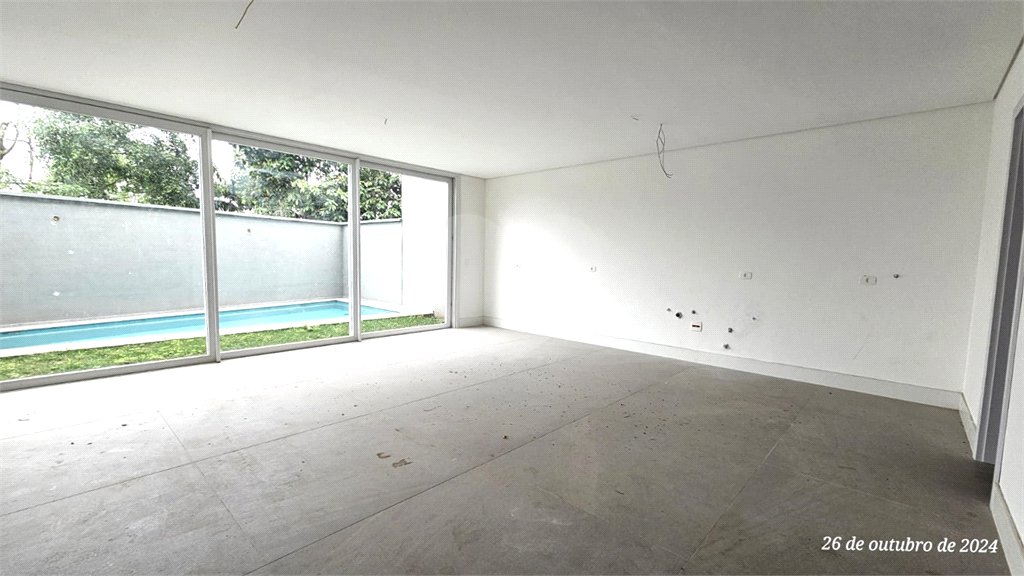 Casa à venda com 4 suítes no condomínio Vila Arese, São Paulo - SP