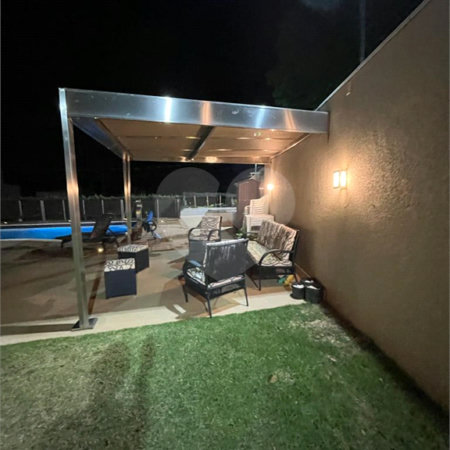 Casa à venda com 4 suítes no condomínio Figueira Garden, Atibaia - SP