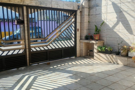 Casa com 3 dormitórios à venda, 140 m² por R$ 425.000,00 - Parque Bitaru - São Vicente/SP