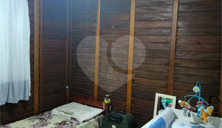 Casa à venda com 4 quartos, sendo 1 suíte, no condomínio Morada da Praia, Bertioga - SP