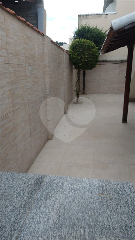 Casa à venda com 3 quartos, sendo 2 suítes, no condomínio Recanto das Palmeiras, Rio de Janeiro - RJ
