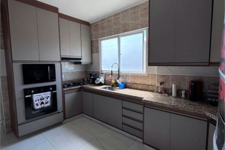 Apartamento com 2 dormitórios à venda, 105 m² por R$ 650.000,00 - Tupi - Praia Grande/SP