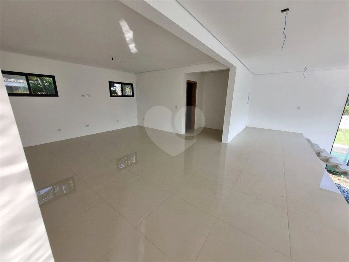 Casa à venda com 4 suítes no condomínio Park Lane, Guarujá - SP