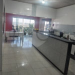 Sobrado 3 quartos e área comercial em baixo.