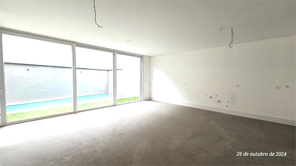 Casa à venda com 4 suítes no condomínio Vila Arese, São Paulo - SP