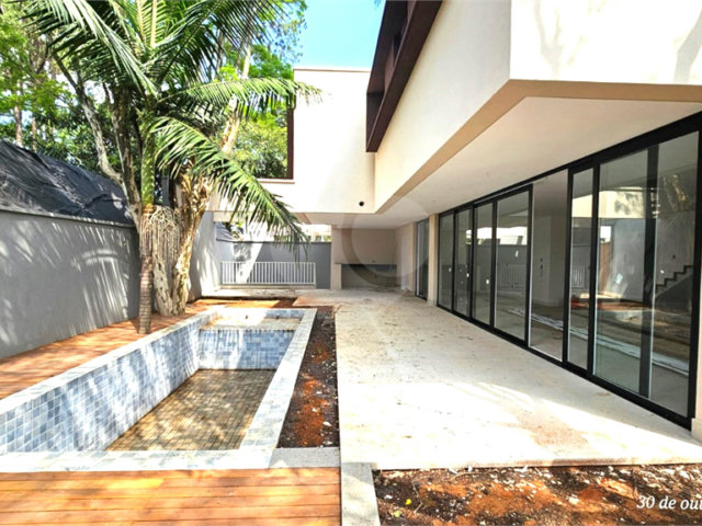 Casa à venda com 4 suítes no condomínio Garda, São Paulo - SP