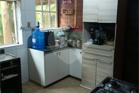 Casa à venda com 4 quartos, sendo 1 suíte,  no condomínio Morada da Praia, Bertioga - SP