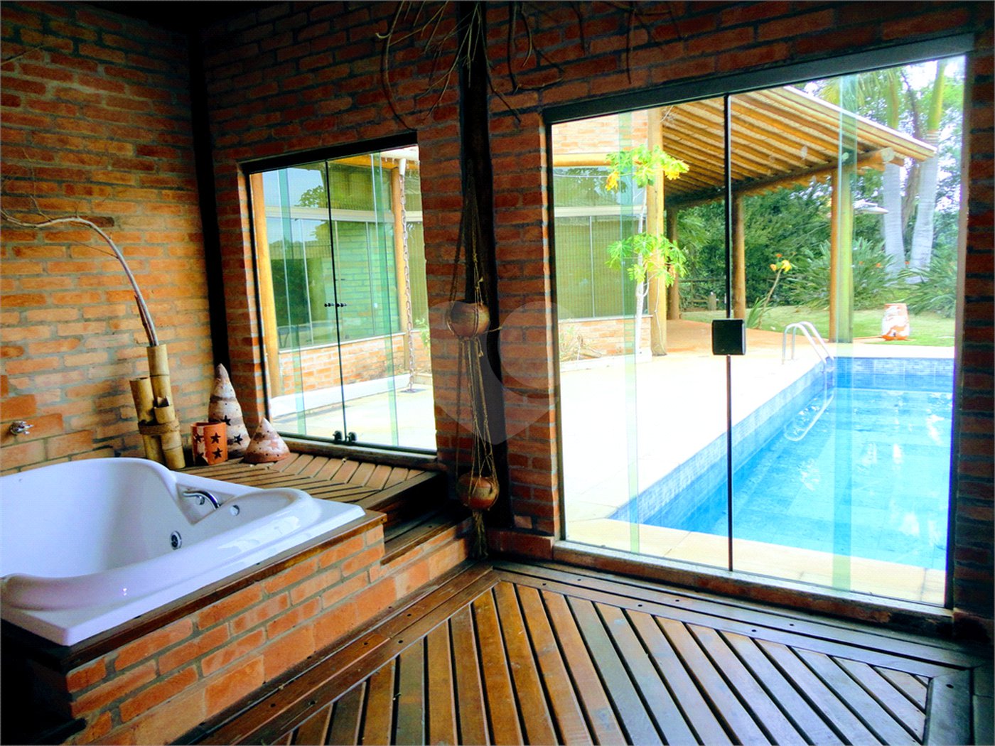 Casa à venda com 4 suítes no condomínio Estância Marambaia, Vinhedo - SP
