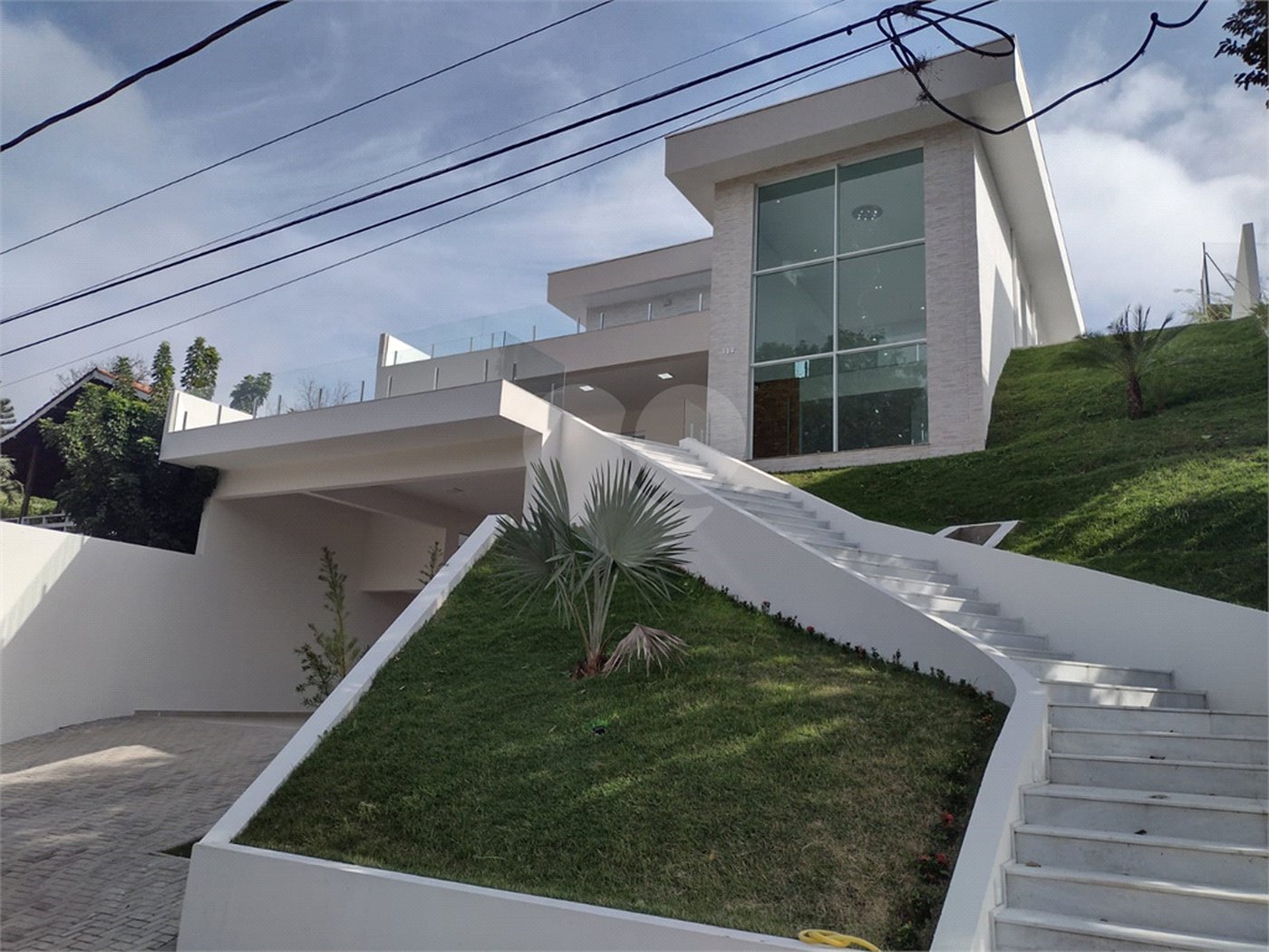 Casa à venda com 4 suítes no condomínio Estância Marambaia, Vinhedo - SP