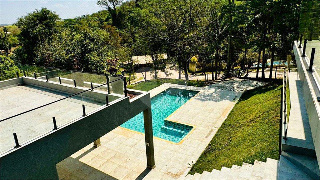 Casa à venda com 4 suítes no condomínio Associação Portal Ouro Verde, Atibaia - SP