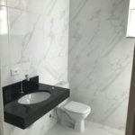 Casa com 3 dormitórios à venda, 116 m² por R$ 690.000,00 - Gonzaga - Santos/SP