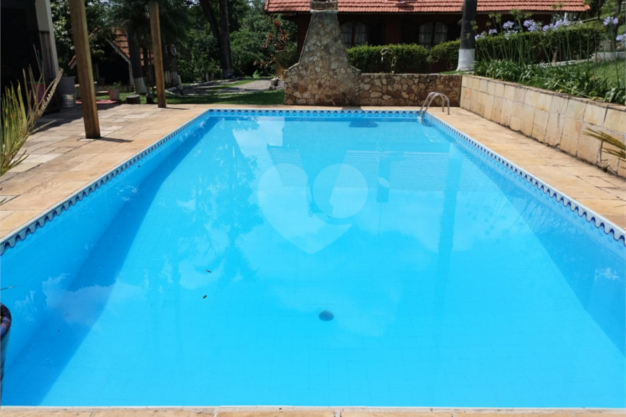 Casa à venda com 4 quartos, sendo 2 suítes,  no condomínio Cinco Lagos, Mairiporã - SP