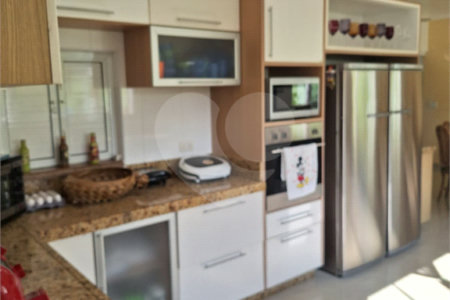 Casa à venda com 4 suítes no condomínio Bougainville, Peruíbe - SP