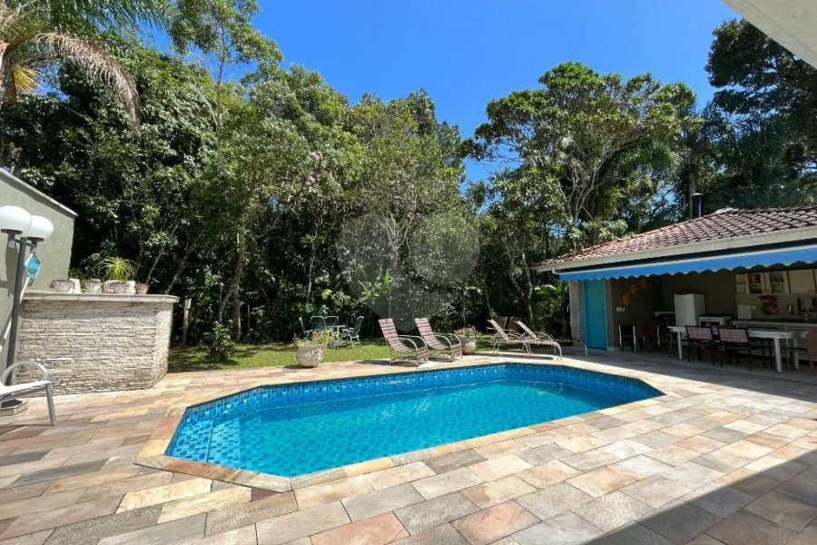 Casa à venda com 4 quartos, sendo 3 suítes, em Riviera de São Lourenço, Bertioga, SP