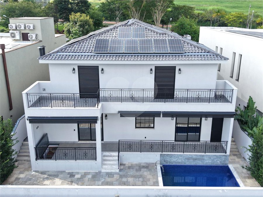 Casa à venda com 4 suítes no condomínio Alphaville Dom Pedro 3, Campinas - SP