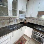 Apartamento com 2 dormitórios à venda, 64 m² por R$ 360.000,00 - Jardim Praiano - Guarujá/SP
