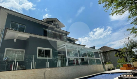Casa à venda ou para alugar com 3 suítes no condomínio Suíça da Cantareira, Mairiporã - SP