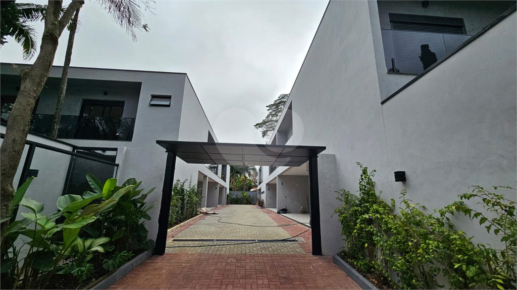 Casa à venda com 4 suítes no condomínio Villa Suiça, São Paulo - SP